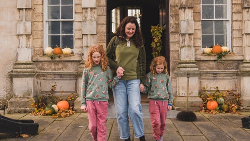 Family at the front door of Florence Court House in Autumn